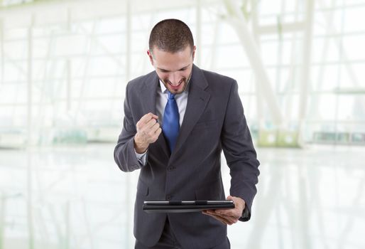 businessman using touch pad of tablet pc, at the office