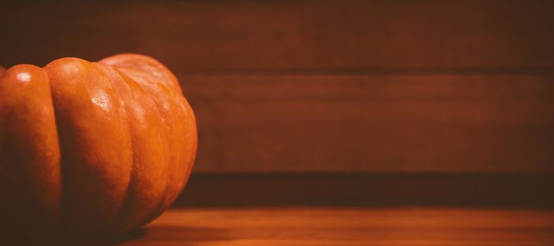 Pumpkin on wooden table during Halloween