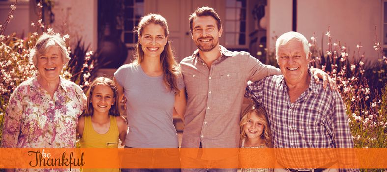 Thanksgiving greeting text against portrait of happy multi-generation family standing together