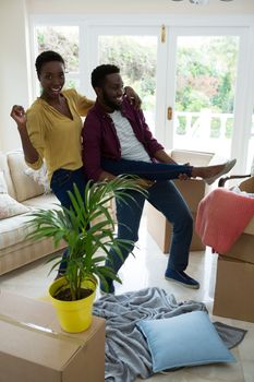 Happy couple enjoying in their new house