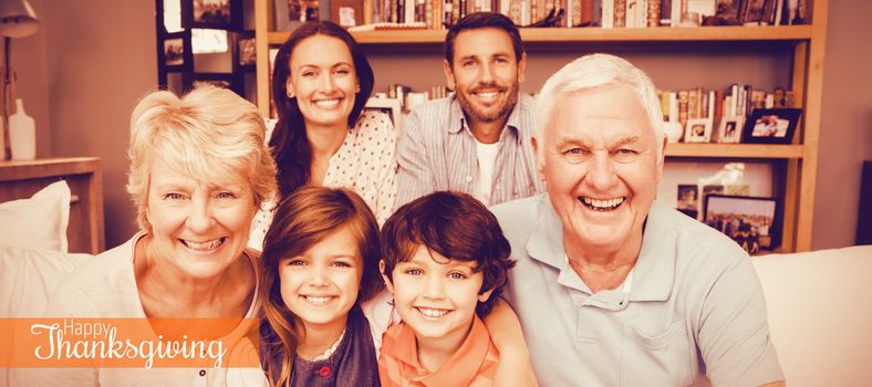 Thanksgiving greeting text against portrait of happy family with grandparents