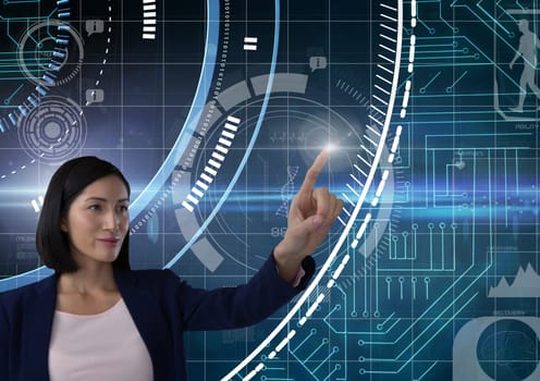 Digital composite of Businesswoman touching air in front of technology science interfaces