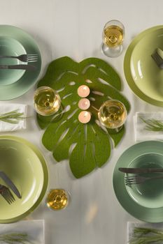 Overhead of wine glasses with table setting