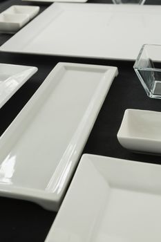 Close-up of black theme table setting