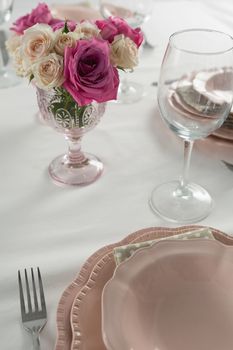 Close-up of plate and cutlery set elegantly on a table