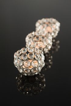 Close-up of decorative designer handcraft candles in a row
