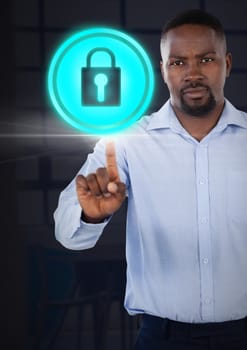 Digital composite of Businessman pointing touching security lock icon