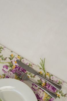 Overhead of elegance table setting on white background