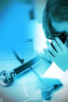 Digital background with magnifying lens against stethoscope on desk