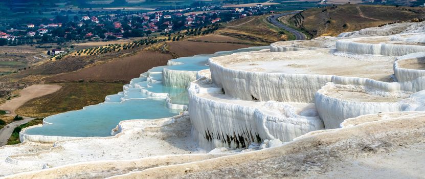 Pamukkale Travertine pool in Turkey on a summer morning.