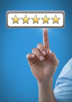 Digital composite of Hand touching five star review ratings