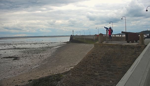 View from boardwalk at Atlantic ocean shore in Cancale, France