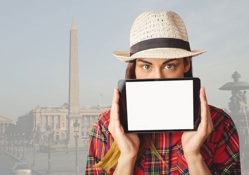 Digital composite of Girl holding tablet in travel destination