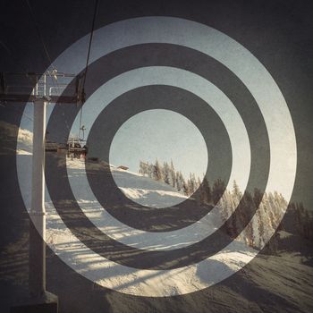 Empty ski lift in the ski resort against blue sky