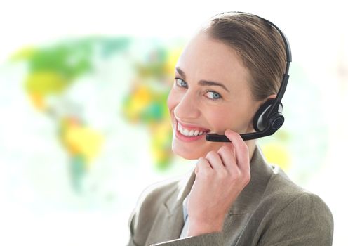 Digital composite of Travel agent woman wearing headset in front of world map