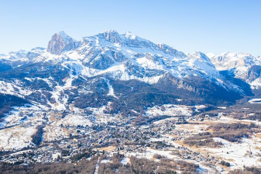 Cortina d'Ampezzo winter city view from Faloria ski area, ski resort in Italy. Cortina , Regina delle Dolomiti, Queen of the Dolomites , Dolomites mountains