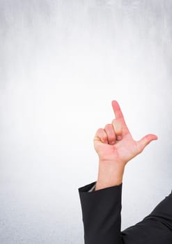Digital composite of Hand pointing with bright background