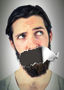 Digital composite of Man with torn paper on mouth