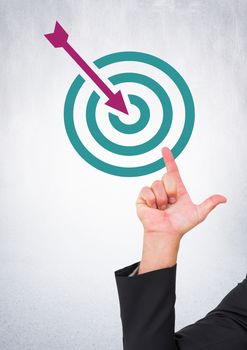 Digital composite of Hand pointing with business target and arrow icon
