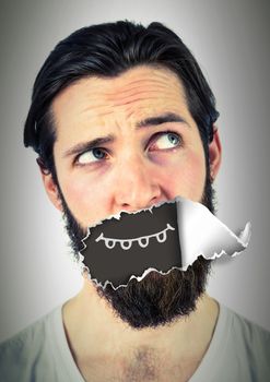 Digital composite of Man with torn paper on mouth and cartoon mouth