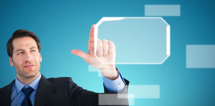 Confident businessman pointing at something against abstract blue background