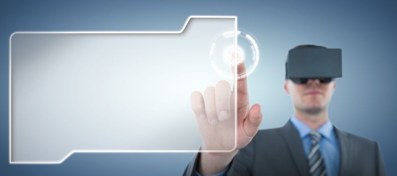 Businessman pointing his finger while using virtual reality headset against abstract blue background