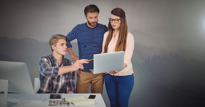 Digital composite of Three people working on laptop