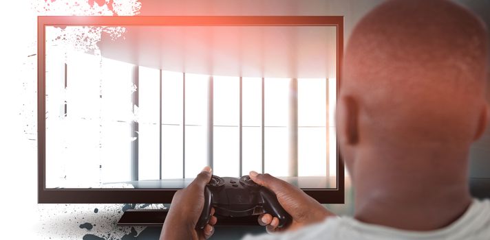 Man playing video game against white background against abstract room