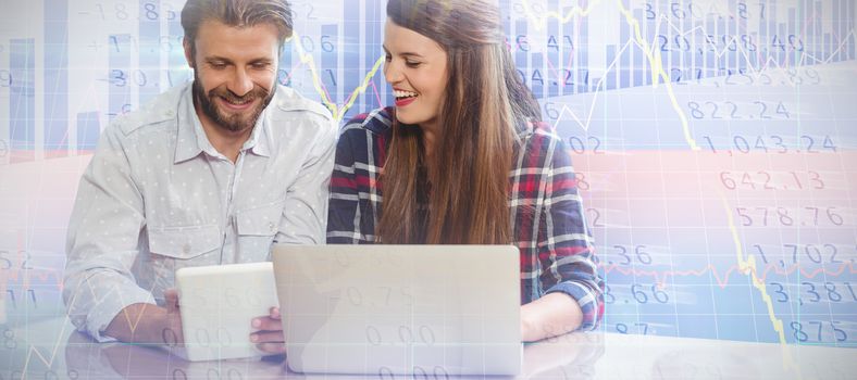 Smioling colleagues using technology against white background against stocks and shares