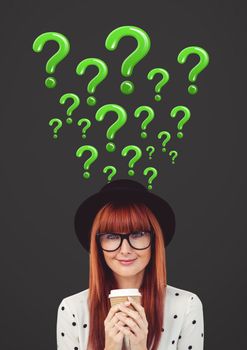 Digital composite of Woman thinking on phone with green shiny question marks