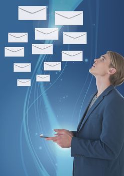 Digital composite of Envelope letter messages and man using phone