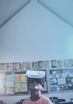 Digital composite of boy with virtual reality headset