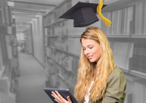 Digital composite of Student woman in education library with graduation hat