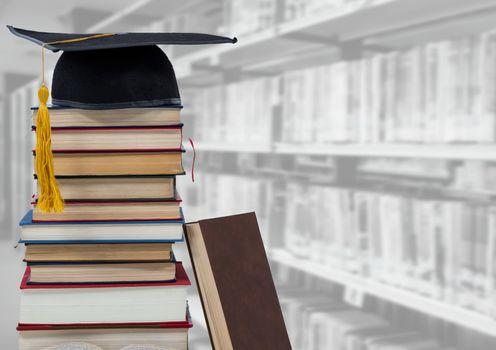 Digital composite of Books and graduation hat in education library