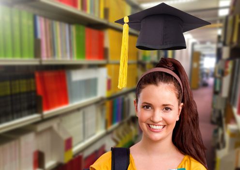 Digital composite of Student woman in education library with graduation hat