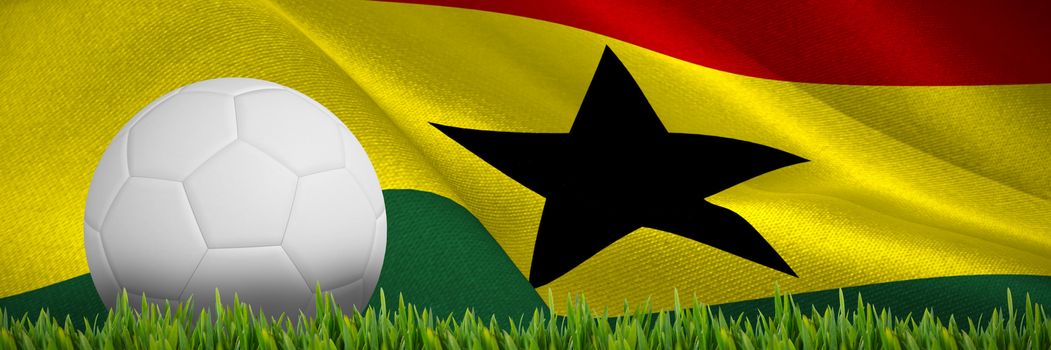 Grass growing outdoors against digitally generated ghana national flag