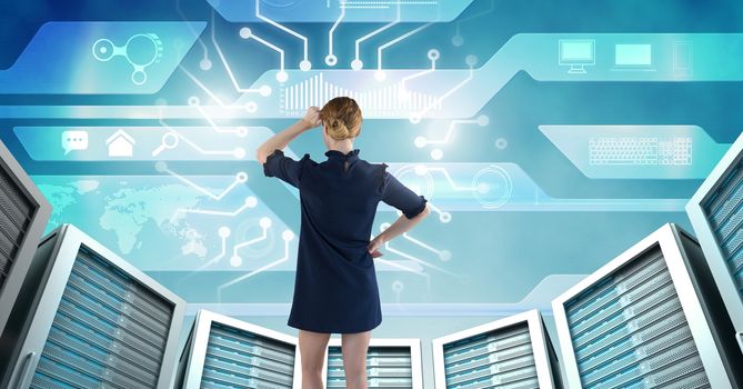 Digital composite of Woman with computer servers and technology information interface