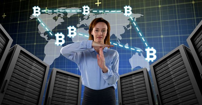 Digital composite of Woman with computer servers and bitcoin technology information interface