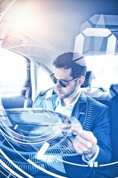 Interface dial countdown with timer in blue background against man reading newspaper at the back of the car