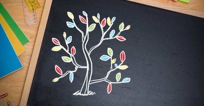 Digital composite of Tree leaves education drawings on blackboard for school