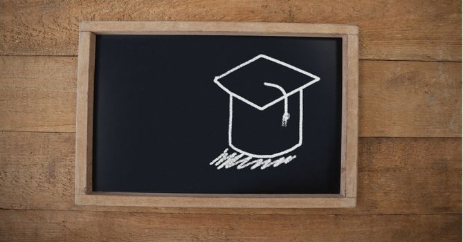 Digital composite of Graduation hat Education drawing on blackboard for school