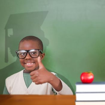 Composite image of cute pupil with graduate shadow in classroom