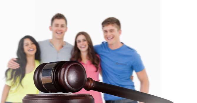Digital composite of Gavel and group of young people
