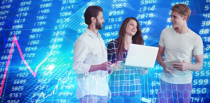 Business people using wireless technology while standing against white background against stocks and shares