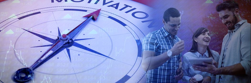 Happy business people planning over digital tablet against compass pointing to motivation