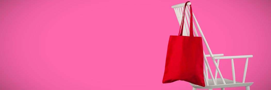 Canvas bag against pink background