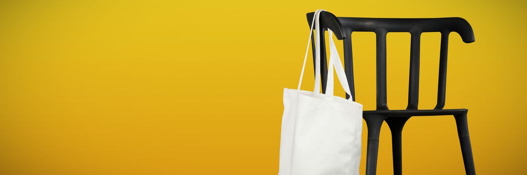 Canvas bag against abstract mustard background