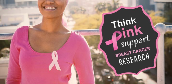 Breast cancer awareness message against smiling women with cancer