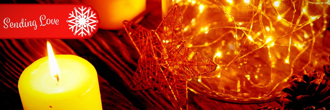 Banner sending love against warm candles and ornament