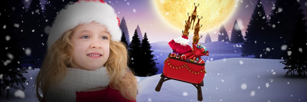 Cute girl in santa hat against christmas house under full moon